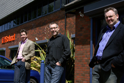 Peter, Simon and Tim outside the Roland offices